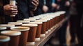 Photo of a colorful row of coffee cups on a table