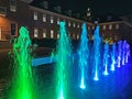 Colorful Water Jets and Old Fannie Mae Building at Night in Washington DC