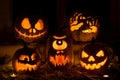 Photo composition from five pumpkins on Halloween. Royalty Free Stock Photo