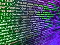 Photo of computer digital background. Developer working on software codes in office. Developing programming and coding Royalty Free Stock Photo