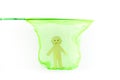 Photo of concept of child rights violation in form of paper cut sad man located inside green net, white background Royalty Free Stock Photo