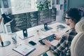 Photo of confident busy programmer wear spectacles typing keyboard framework indoors workplace workshop home