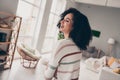 Photo of confident cheerful lady dressed striped pullover arms folded laughing indoors apartment room Royalty Free Stock Photo