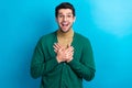 Photo of confident excited man wear green cardigan spectacles arms chest open mouth isolated blue color background Royalty Free Stock Photo