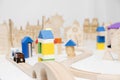 Constructor, wooden city. Children game on the table