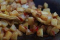 photo of cooking potatoes and omelet with spicy seasoning