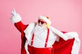 Photo cool funky santa claus big abdomen listen x-mas christmas radio songs headphones dance newyear event raise finger