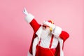 Photo of cool funky santa claus listen christmas x-mas radio songs headphones dance newyear celebration event wear Royalty Free Stock Photo