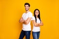 Photo of cool pair lady and guy working together beat partners crossing arms wear casual outfit isolated yellow color