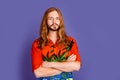 Photo of cool serious confident person with long hairstyle dressed print shirt standing arms crossed isolated on violet