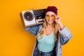 Photo of cool stylish lady long hairdo good mood free time hold shoulder vintage tape recorder wear casual turquoise