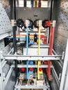 Photo of copper bar connection in low voltage switchboard compartment. Royalty Free Stock Photo