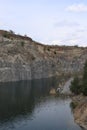 Photo that covers both a portion of the Emerald Lake and a portion of the basalt hill that surrounds it