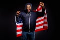 Photo of crazy afro american guy hold usa flag encourage fight stop discrimination scream wear sweater jumper denim