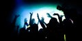 Photo of crazy bachelors enjoy dj rock star performance in private bar raise hands up dance shadow neon lights
