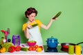 Photo of crazy cool girl prepare supper hold cucumber dance have table pepper tomato ingredients wear hair rollers