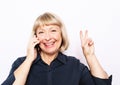 Photo of crazy ecstatic old woman use smartphone impressed social media like feedback win raise fists scream yes Royalty Free Stock Photo