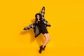 Photo of crazy energetic lady dance stand tiptoe wear hat plaid coat mini dress boots  yellow color background Royalty Free Stock Photo