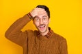 Photo of crazy funny guy palm forehead open mouth wear eyeglasses brown pullover isolated yellow background