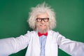 Photo of crazy genius mature inventor dressed white uniform bow tie glasses tacking selfie isolated green color