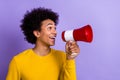 Photo of crazy protest demonstration activist young guy hold loudspeaker scream his text against racism isolated on