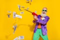 Photo of crazy retired pensioner grandfather win million usd dollars shoot money gun isolated on bright color background Royalty Free Stock Photo