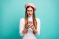 Photo of crazy shocked lady hold telephone reading new post negative comments open mouth wear specs modern pink beret Royalty Free Stock Photo