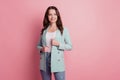 Photo of curious confident business woman in fashionable outfit look empty space on pink background