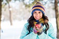 Photo of curious funny lady hold takeout cup look side beaming smile wear knitted hat scarf coat in park outdoors Royalty Free Stock Photo