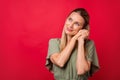 Photo of curious mature blond lady look empty space wear khaki dress isolated on red color background