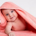 Photo cute baby in pink towe