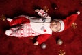 Photo of cute little sleeping baby in Santa Hat Royalty Free Stock Photo