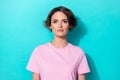 Photo of cute short hairdo young lady wear pink t-shirt isolated on teal color background