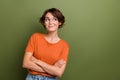 Photo of cute young business lady folded arms looking empty space deciding what to do in her future isolated on khaki Royalty Free Stock Photo