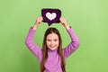 Photo of daughter demonstrate painted purple symbol instagram click like heart wear pink turtleneck on green