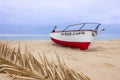 PHOTO DAWN AND A BOAT WITH ARABIAN TITLE