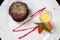 Photo of delicious chocolate dessert with berries on wooden table