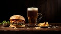 Delicious Burger, Fries, And Beer On Wooden Background Royalty Free Stock Photo