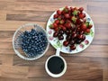 A photo of a delicious plate of fruit and black coffee Royalty Free Stock Photo