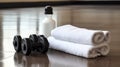 Bottle of Water and Towels on Floor - Hydration and Relaxation Accessory Setup Royalty Free Stock Photo