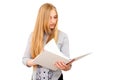 Pretty female blonde student reading books on white isolated background Royalty Free Stock Photo
