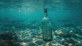 Lonely Message in a Bottle Adrift in the Ocean Waves Royalty Free Stock Photo