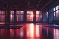 This photo depicts a spacious room with numerous windows and a distinctive red floor, An empty gym with lights dimmed for a yoga