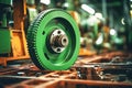 Photo of a detailed view of a rotating wheel on a industrial conveyor system. Modern metal processing at an industrial enterprise