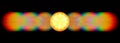 Photo of the diffraction pattern of LED lamp light, comprising a large number of diffraction orders