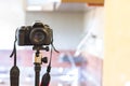 Photo digital camera with a big lens on a tripod Royalty Free Stock Photo