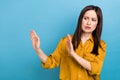 Photo of dissatisfied business woman yellow shirt hands veto against feminism rights stop propaganda empty space