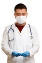 Photo of doctor in mask and white coat with phonendoscope with palms raised up. Royalty Free Stock Photo