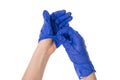 Photo of doctor taking off her disposable protective gloves isolated over white background