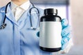 Doctor holding a vitamins bottle Royalty Free Stock Photo